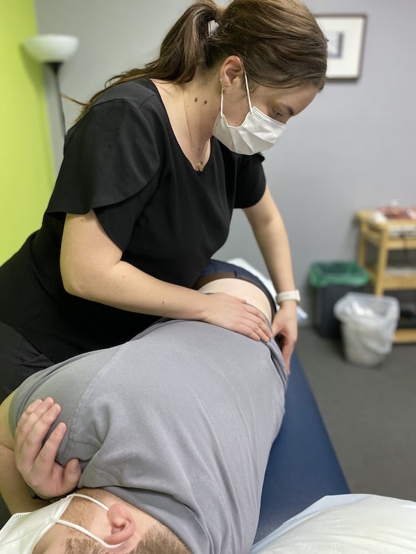 Physio Maddie Milne solving low back pain Adelaide near me at Adelaide West Physio + Pilates | Headache Clinic