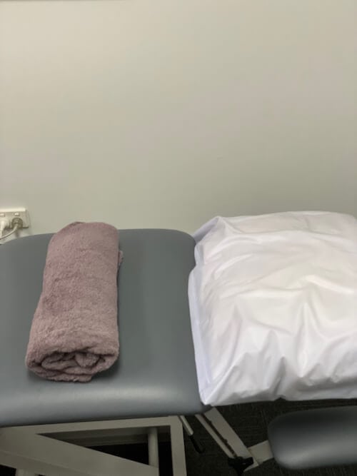 Alternative rolled towel positioning for thoracic spine stretch