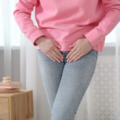 woman struggling with managing urine lead needing women's health physio treatment